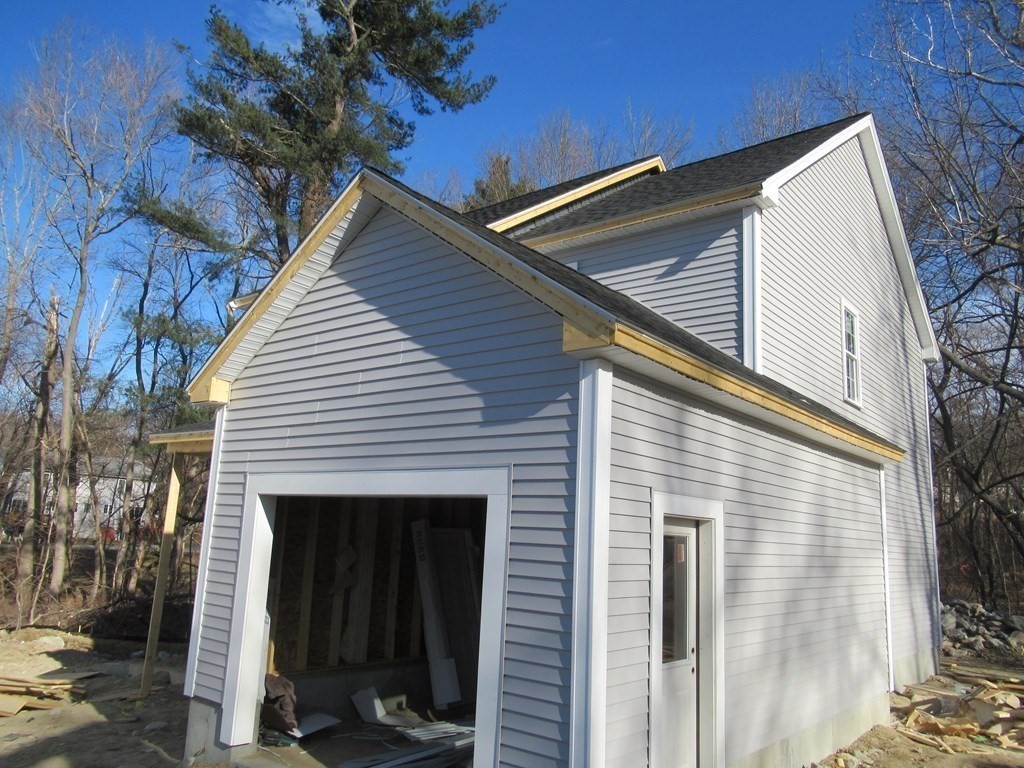 16 Farnum Street Uxbridge, MA 01569 - Photo 10 of 27 a view of backyard of the house