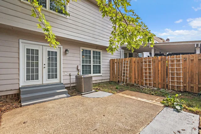 a front view of a house with a garage