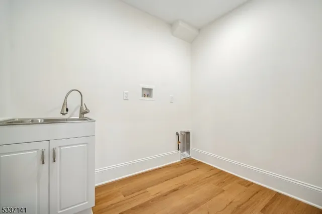 a bathroom with a sink and vanity