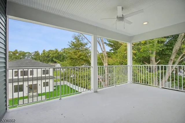 a view of balcony with furniture