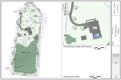 a view of an ocean and a yard