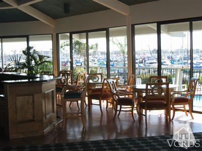 2901 Peninsula Road, Unit 247 Oxnard, CA 93035 - Photo 23 of 30 a view of a dining room with furniture window and outside view