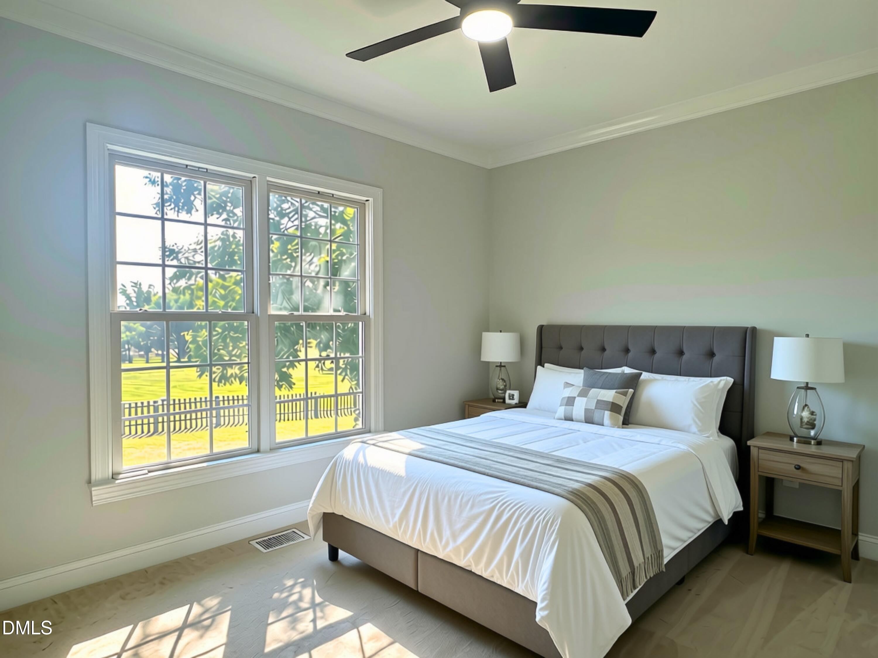 3100 Donlin Drive Wake Forest, NC 27587 - Photo 30 of 67 Bright, light-filled bedroom showcasing large multi-pane windows with natural outdoor scenery, hardwood flooring, an upholstered platform bed with tufted headboard, matching nightstands with integrated lighting, and a modern ceiling fan with brushed metal finish