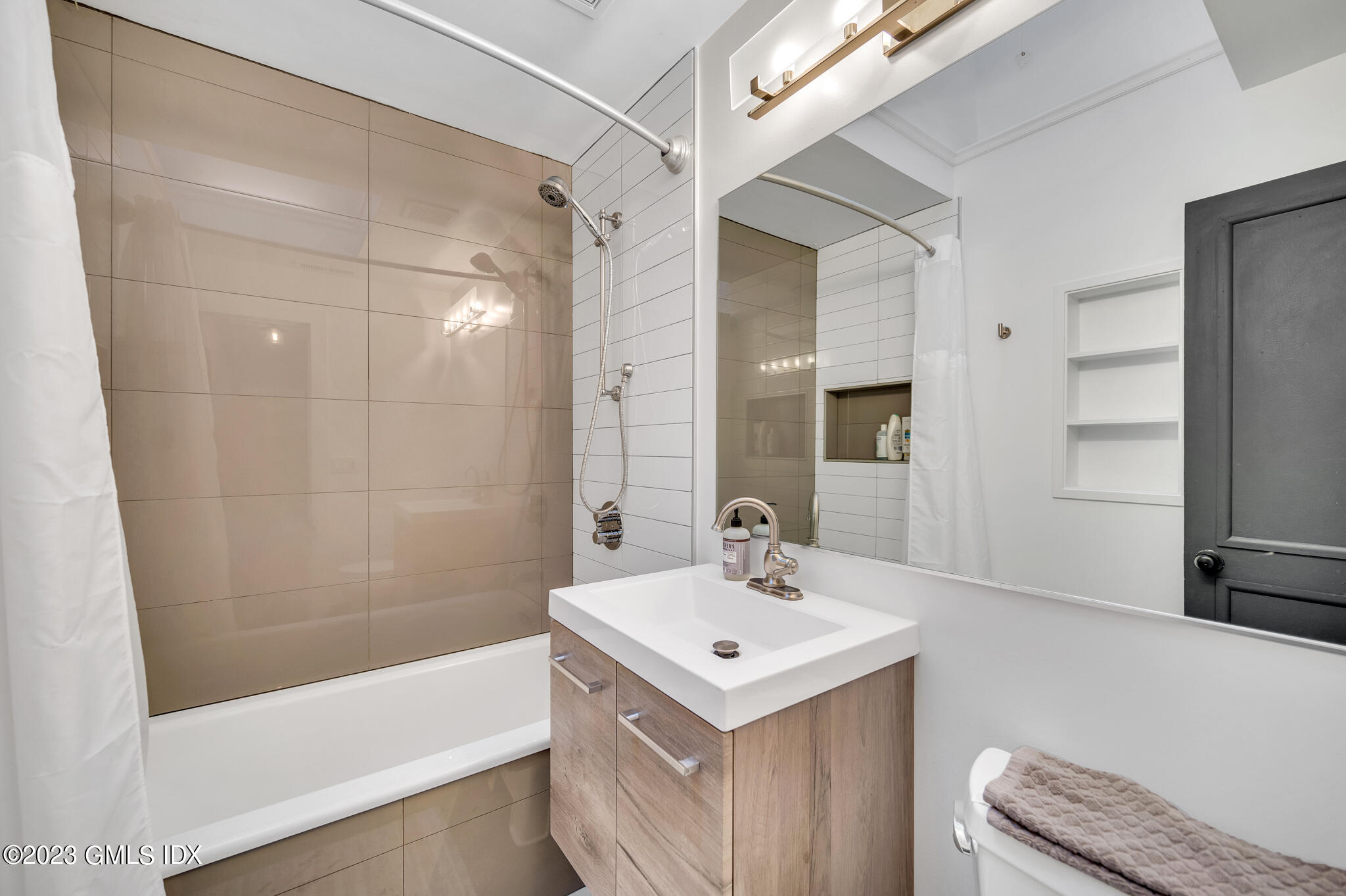 12 Taylor Drive Cos Cob, CT 06807 - Photo 15 of 21 a bathroom with a sink a toilet and shower