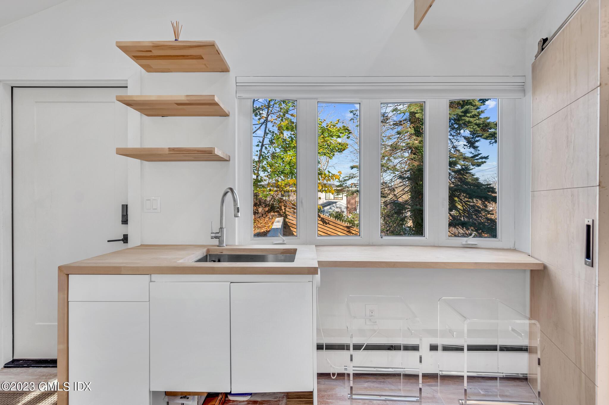 12 Taylor Drive Cos Cob, CT 06807 - Photo 16 of 21 a bathroom with a sink and a window