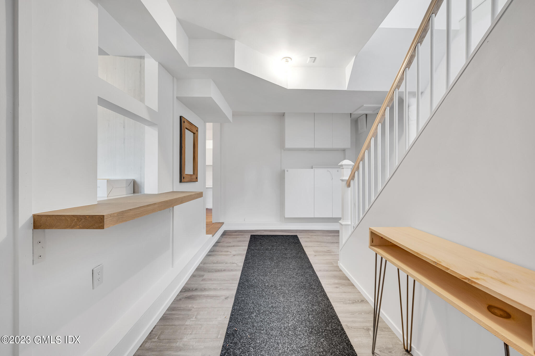 12 Taylor Drive Cos Cob, CT 06807 - Photo 6 of 21 a view of a hallway with staircase