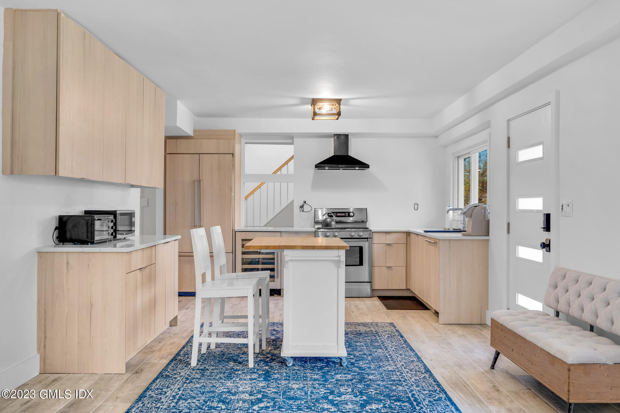 12 Taylor Drive Cos Cob, CT 06807 - Photo 9 of 21 a kitchen with a sink and white appliances