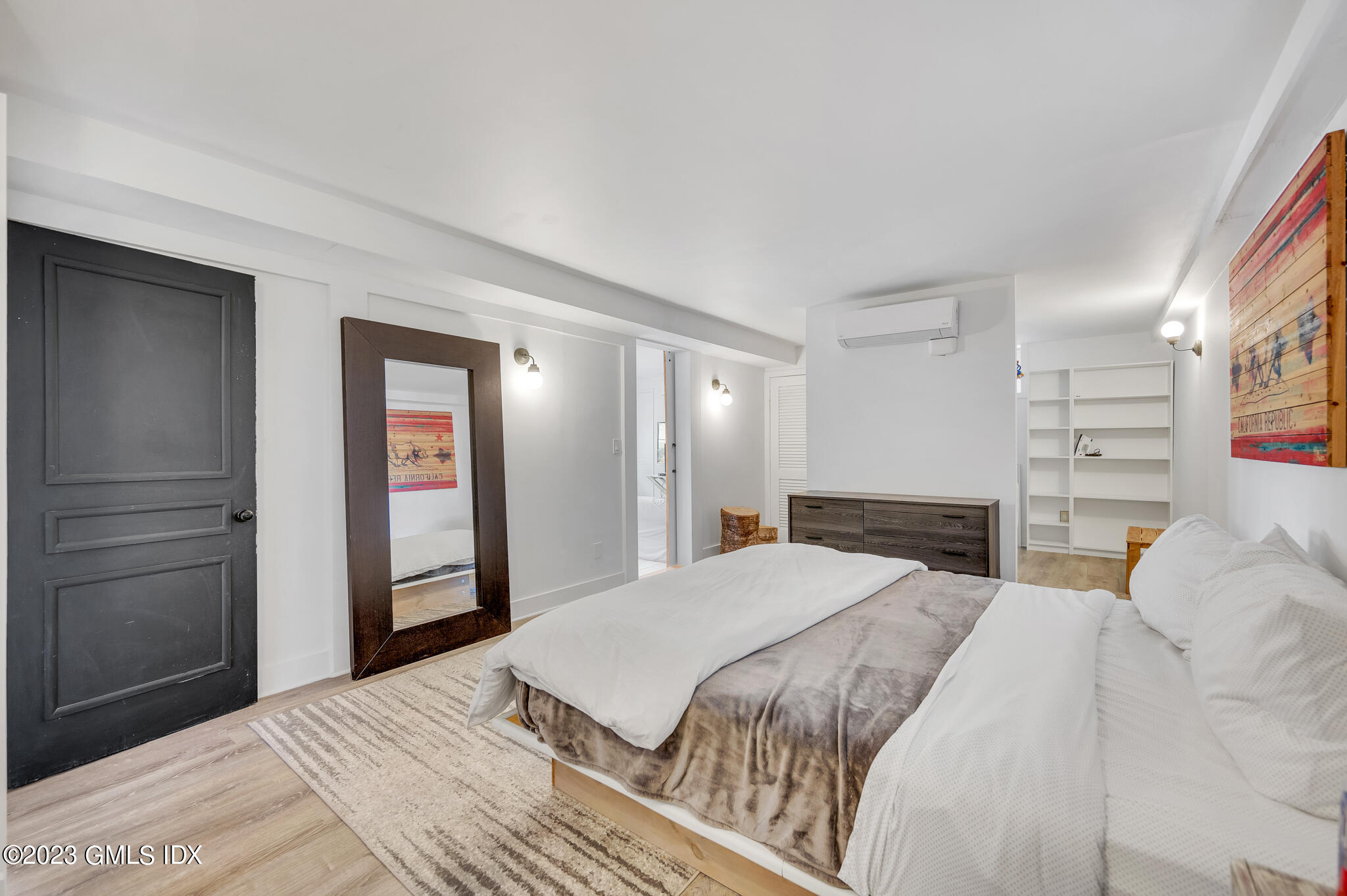 12 Taylor Drive Cos Cob, CT 06807 - Photo 10 of 21 a bedroom with a bed and a mirror