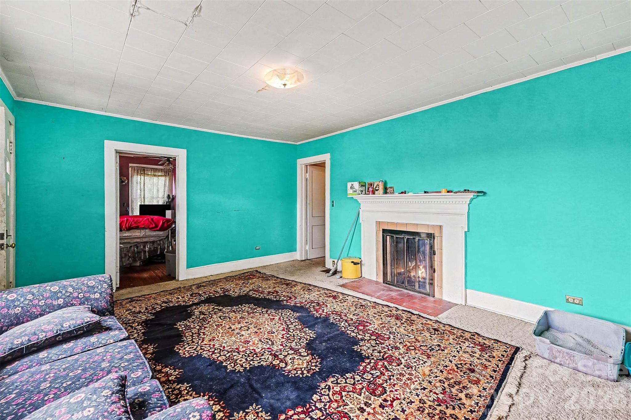 1116 Medlin Road Monroe, NC 28112 - Photo 15 of 40 a bedroom with a bed and a fireplace