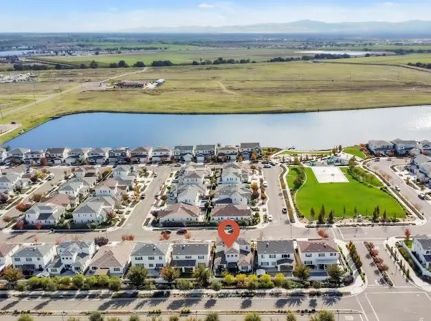 a view of a city with an ocean