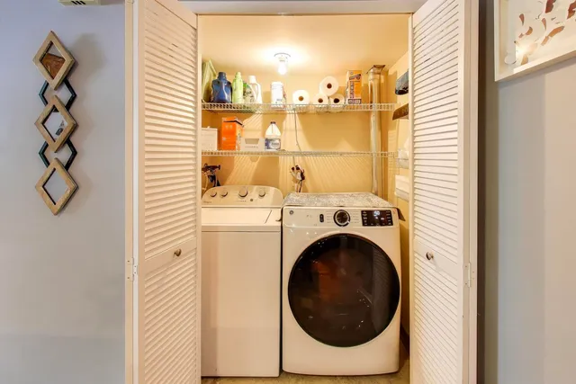 a utility room with dryer and washer