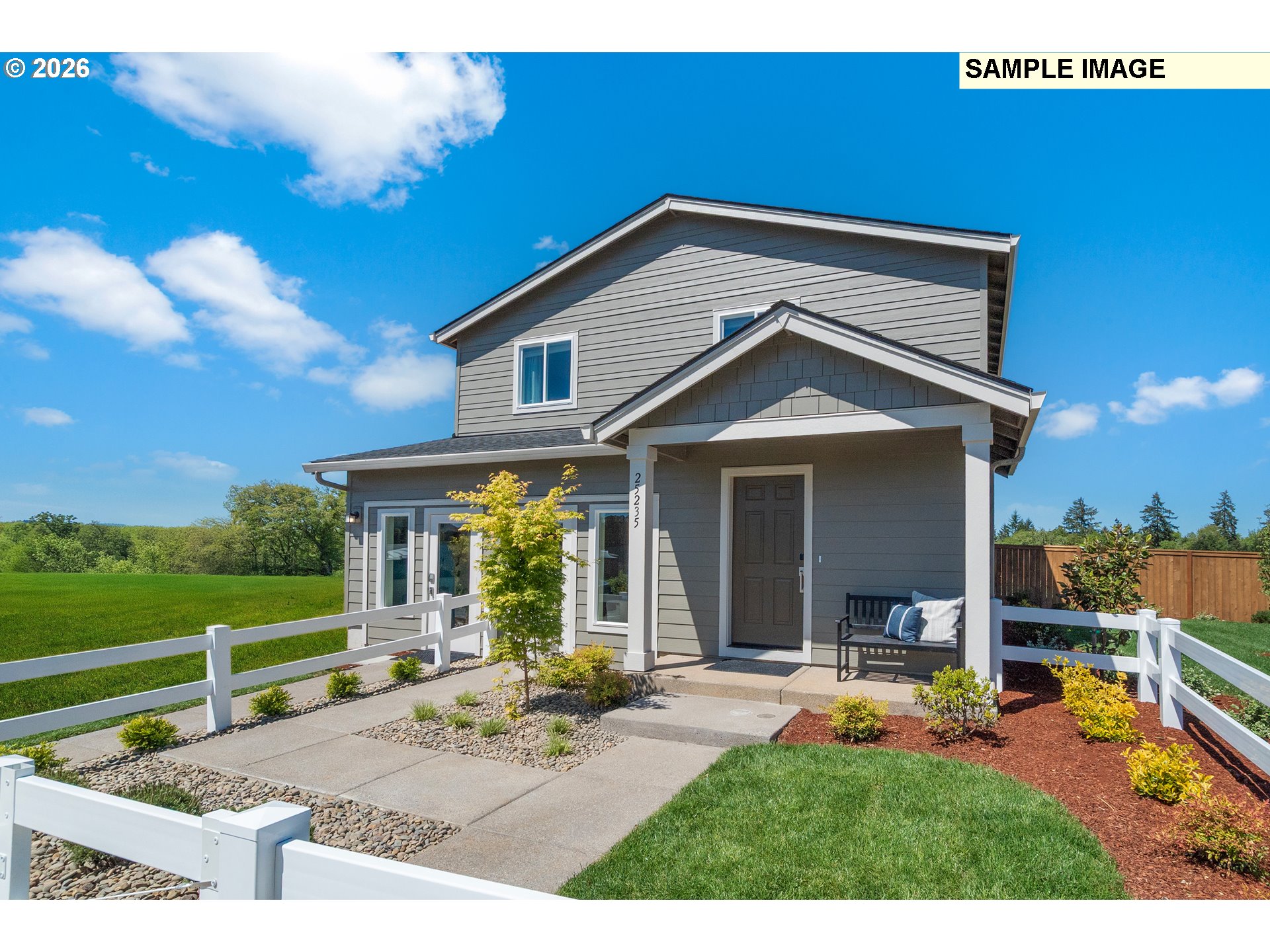 5754 Bainbridge Road Eugene, OR 97402 - Photo 6 of 29 a backyard of a house with table and chairs