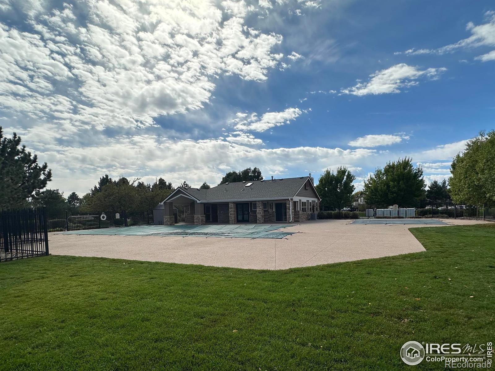 3453 Rhea Drive Loveland, CO 80537 - Photo 30 of 33 a view of patio with swimming pool and green space