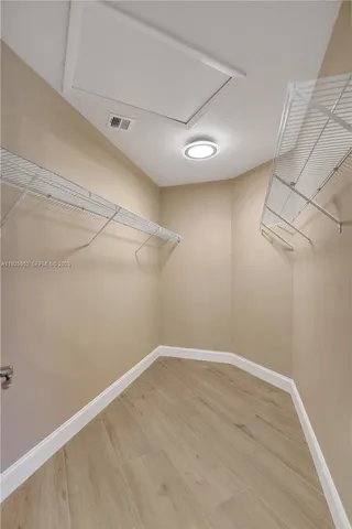 a view of a room with racks on the wall