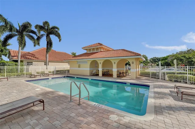 a view of a house with a swimming pool
