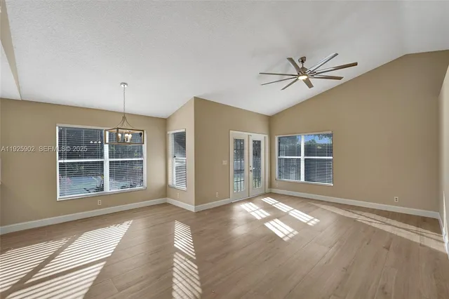 a view of empty room with windows