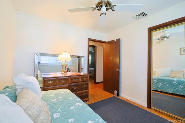 a room with furniture and wooden floor