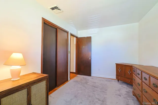 a view of hallway with livingroom