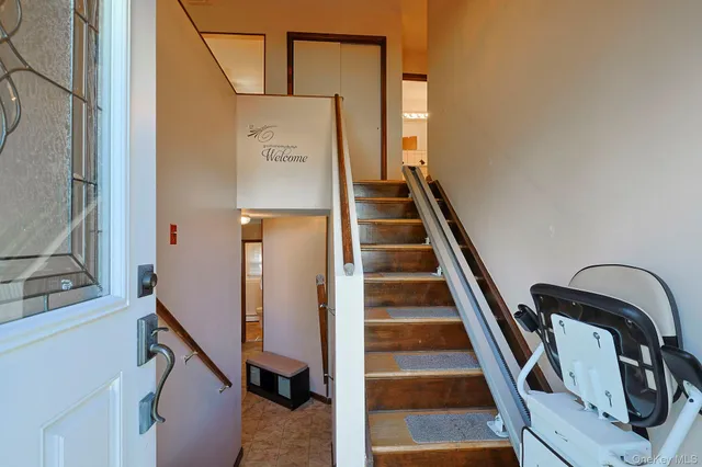 a view of an entryway with staircase