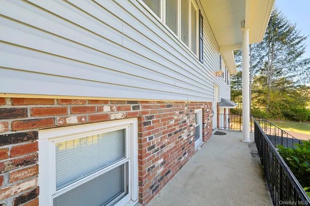 a view of a street with an outdoor space