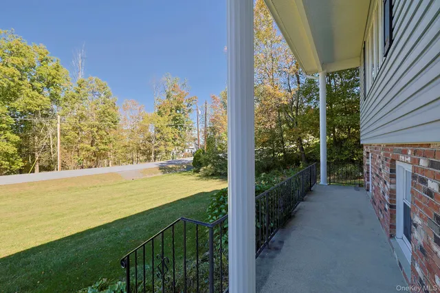 a view of a balcony with an outdoor space
