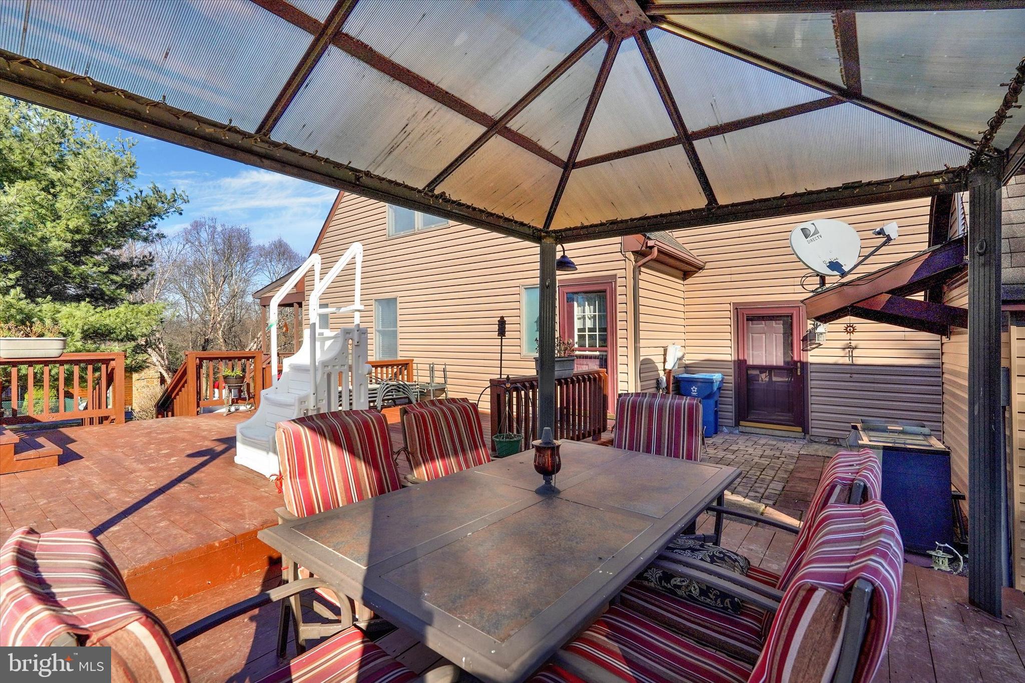 13300 Trout School Road Felton, PA 17322 - Photo 27 of 33 Nice eating/ sitting area on deck by pool