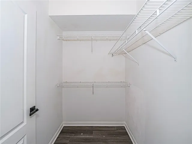 a view of a room with racks on the wall