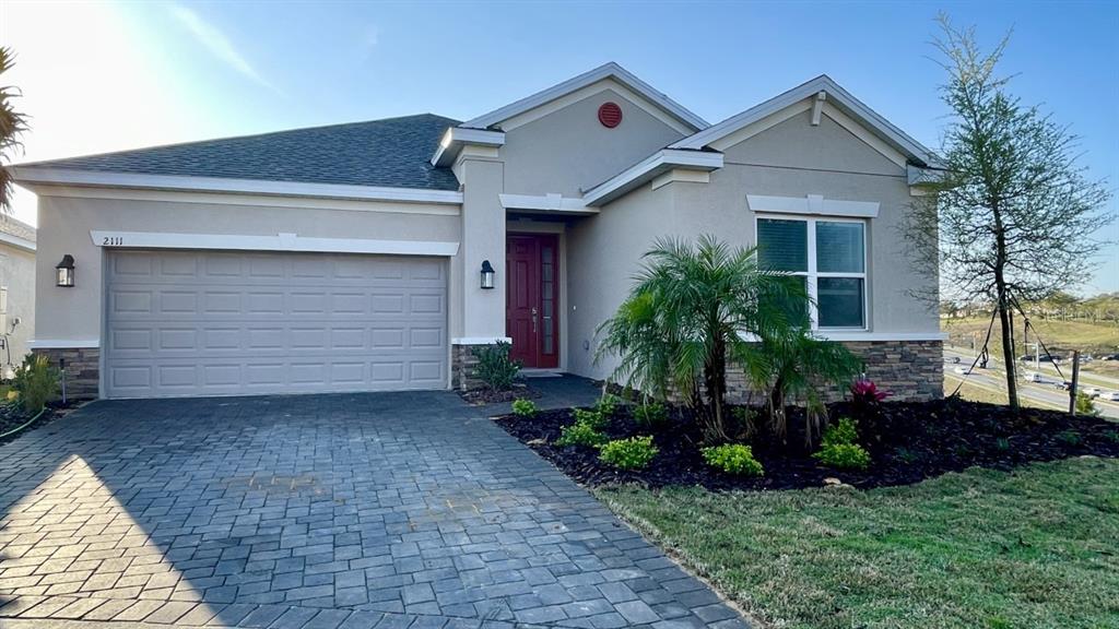 2111 Ridge Pointe Lane Clermont, FL 34715 - Photo 1 of 1 a house view with a outdoor space