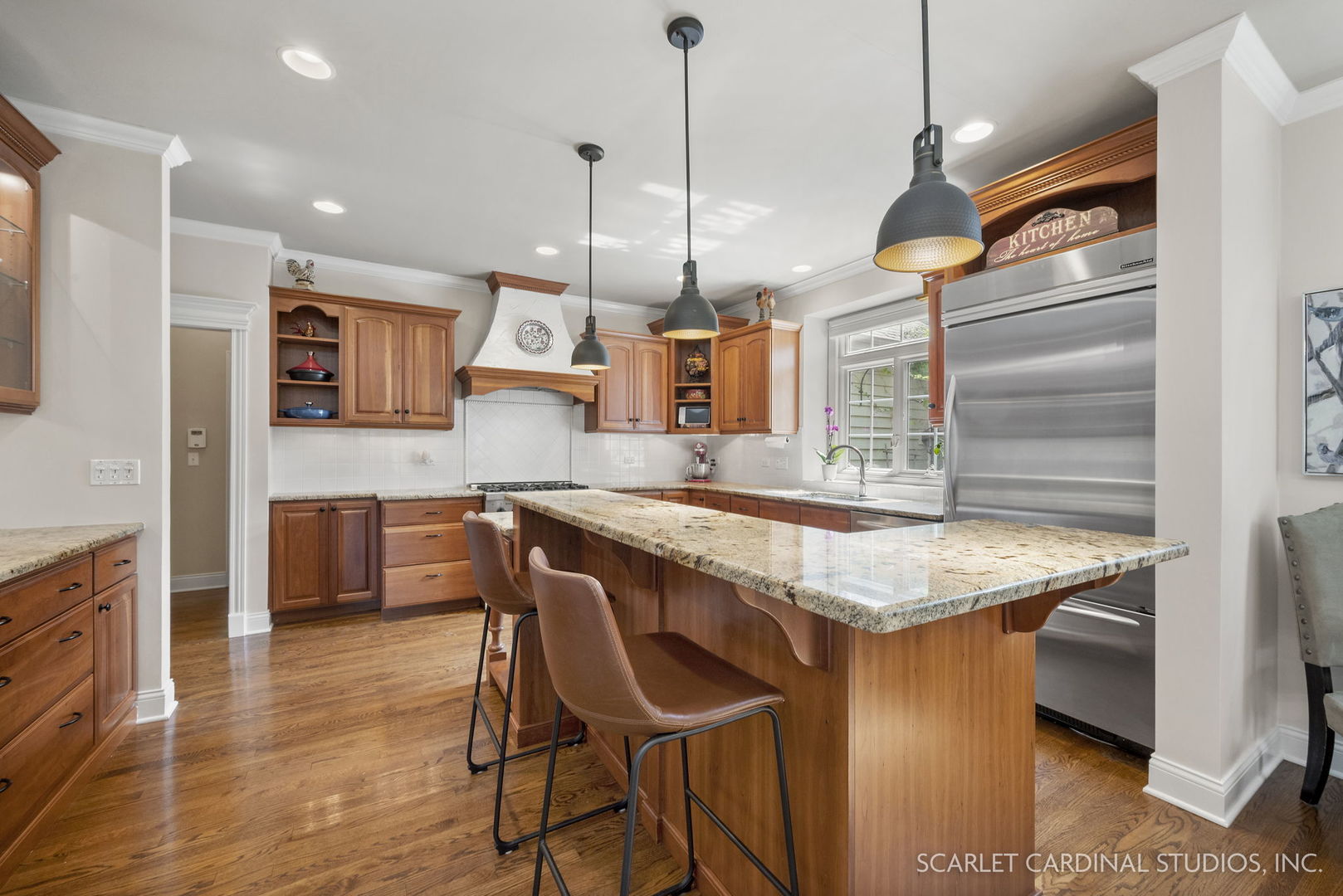1736 Robert Lane Naperville, IL 60564 - Photo 19 of 82 a kitchen with stainless steel appliances granite countertop wooden cabinets sink and stove