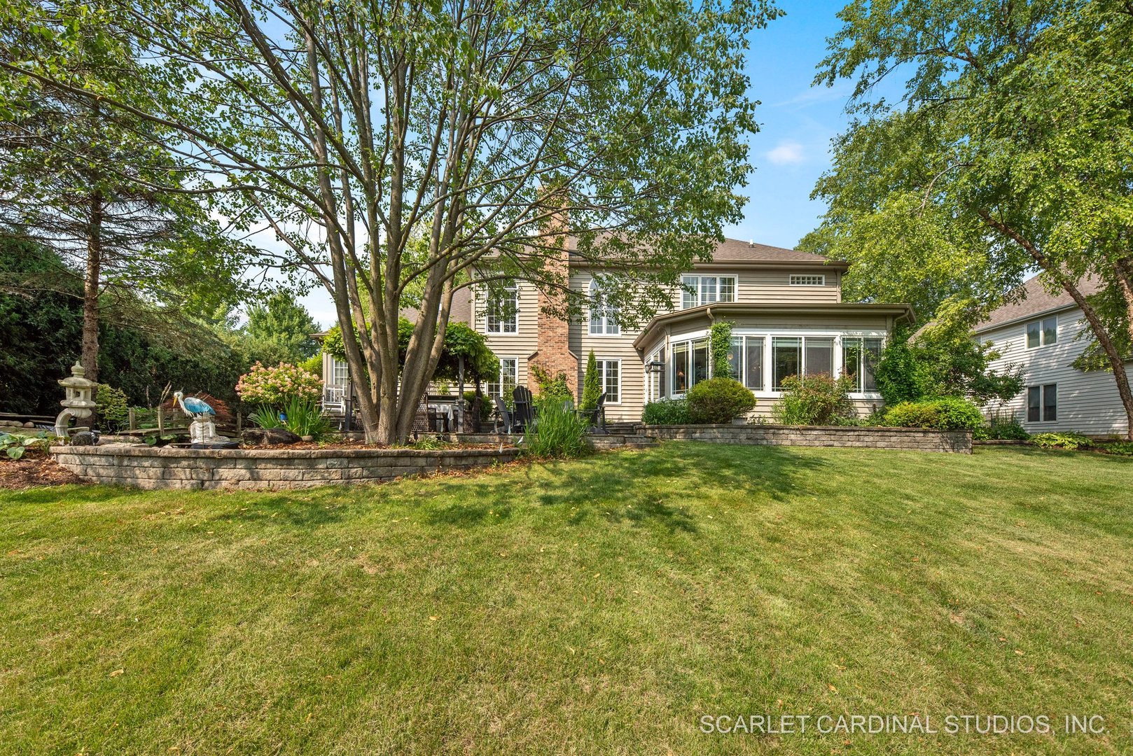 1736 Robert Lane Naperville, IL 60564 - Photo 62 of 82 a view of a house with swimming pool and sitting area