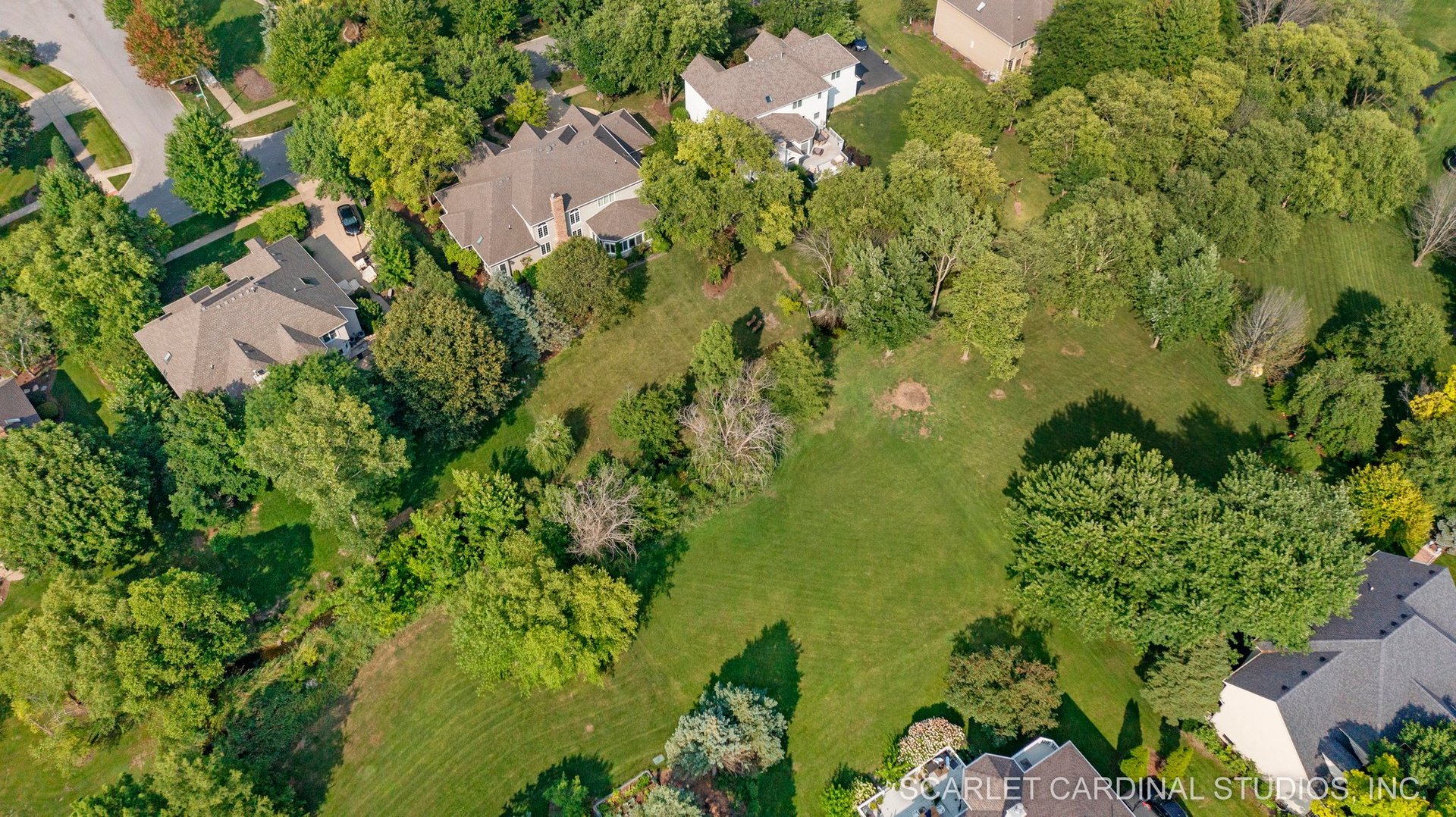 1736 Robert Lane Naperville, IL 60564 - Photo 63 of 82 an aerial view of residential house with swimming pool and lawn chairs
