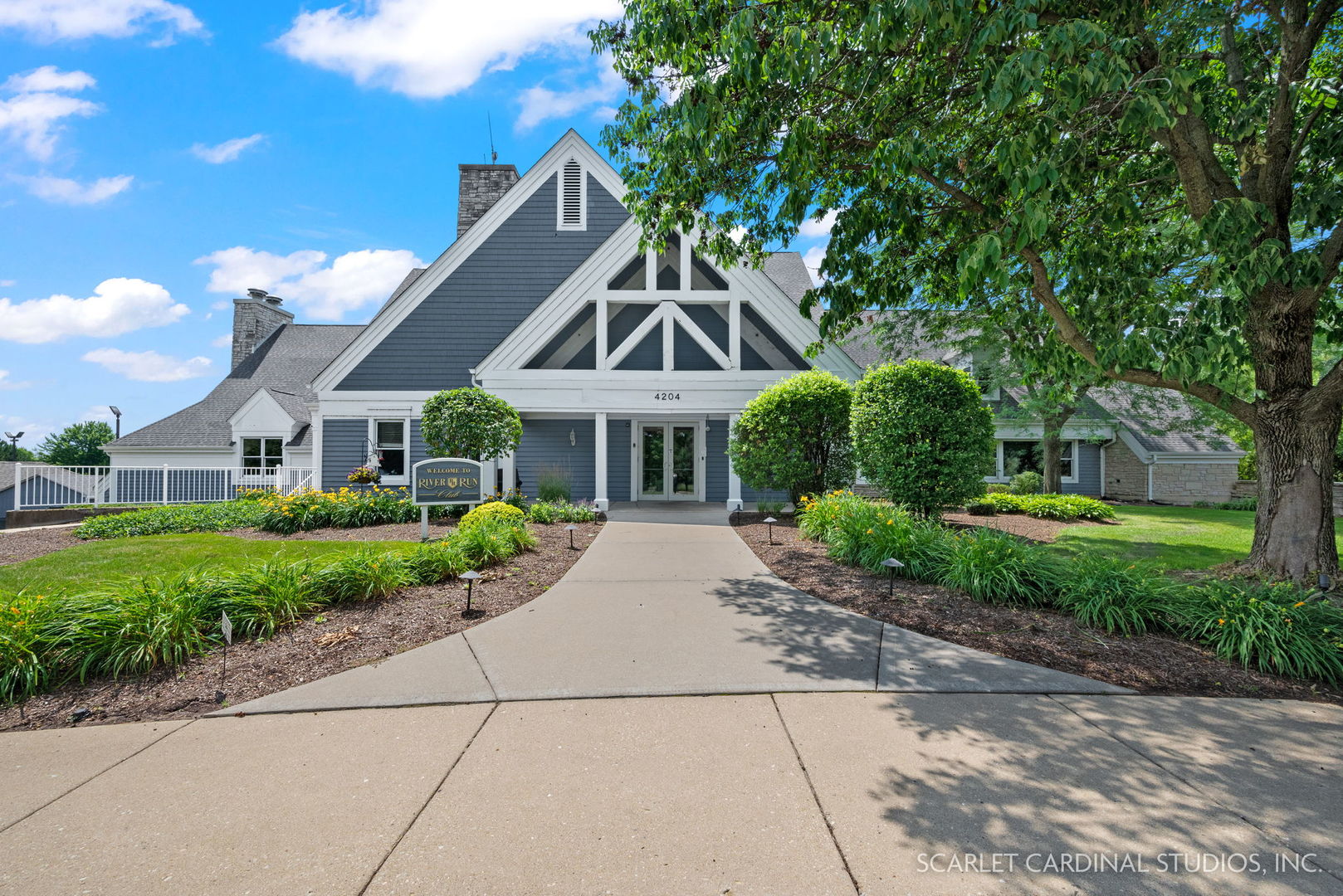 1736 Robert Lane Naperville, IL 60564 - Photo 72 of 82 a front view of a house with a garden