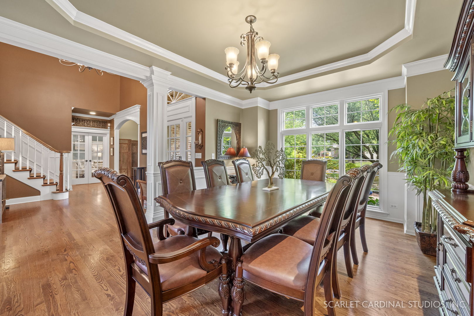 1736 Robert Lane Naperville, IL 60564 - Photo 10 of 82 a dining room with furniture a chandelier and wooden floor