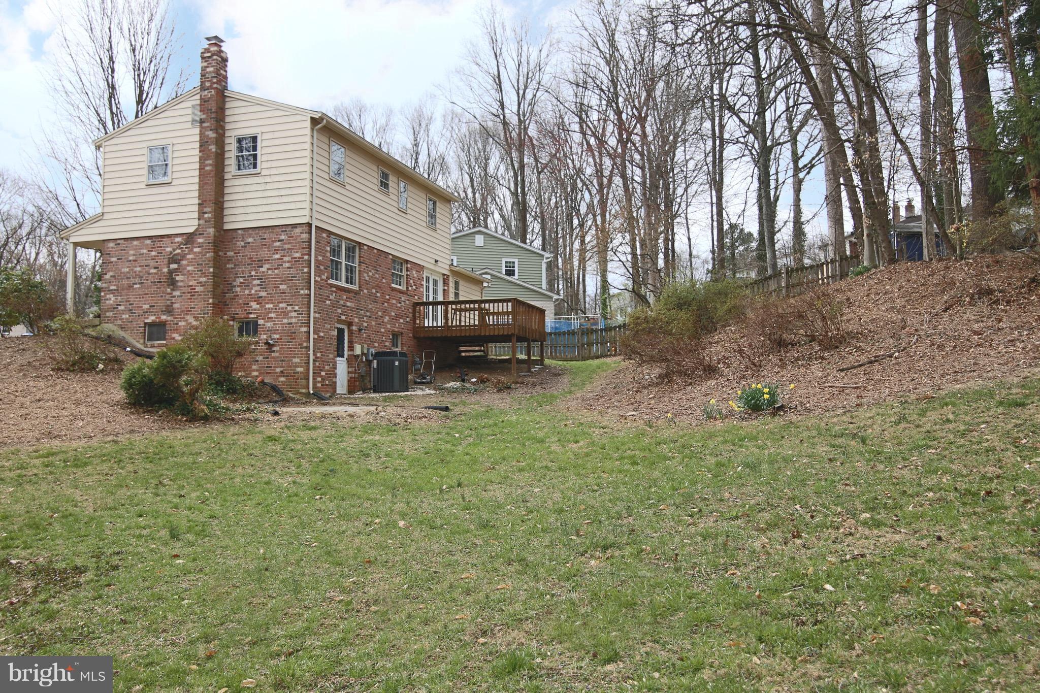 6700 Little Ann Court Springfield, VA 22152 - Photo 28 of 30 Large Side Yard backs to Trees