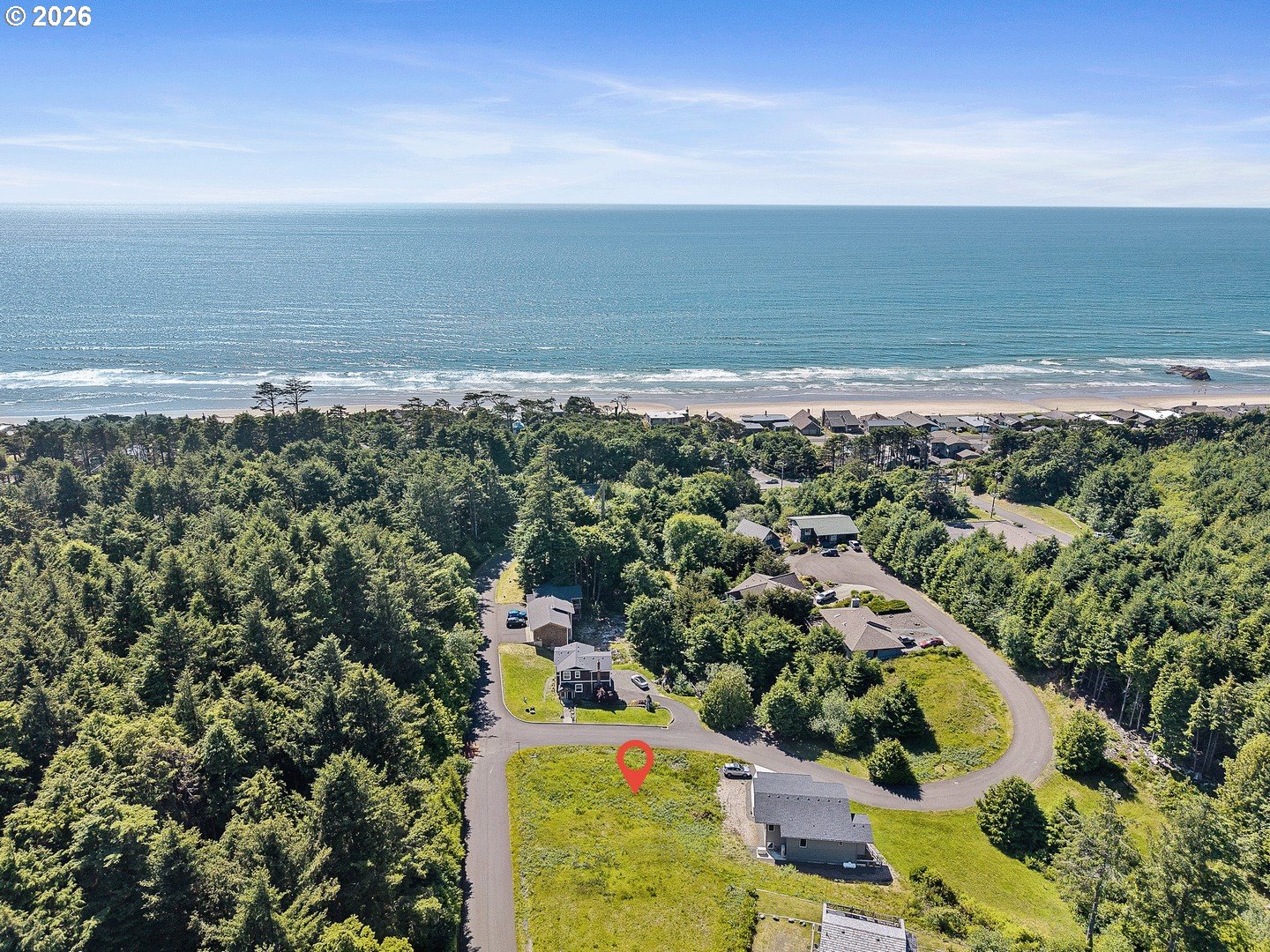 Cedar Lane, Unit 13 Arch Cape, OR 97102 - Photo 2 of 12 a view of a city and ocean view