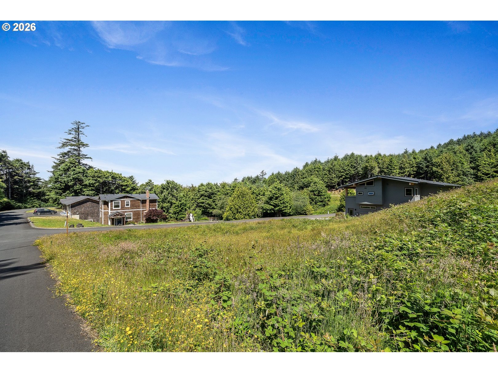 Cedar Lane, Unit 13 Arch Cape, OR 97102 - Photo 6 of 12 a view of a lake with outdoor space