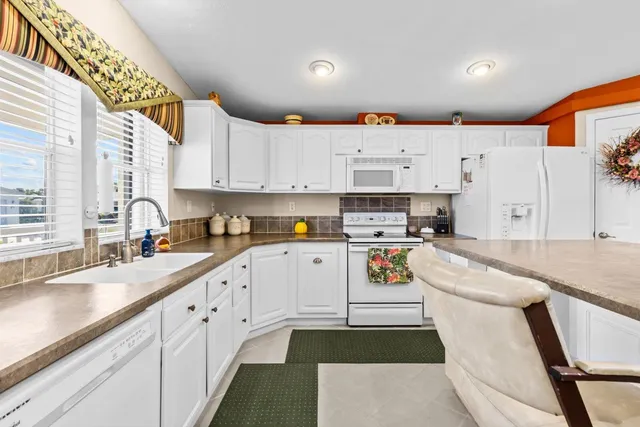 $214,900 | 3116 8th Hole Drive, Port St. Lucie, FL 34952