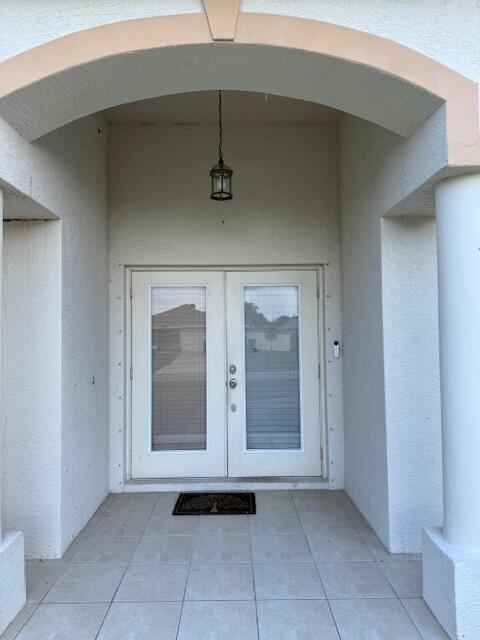 2619 Southwest Ann Arbor Road Port St. Lucie, FL 34953 - Photo 2 of 18 Double door entry