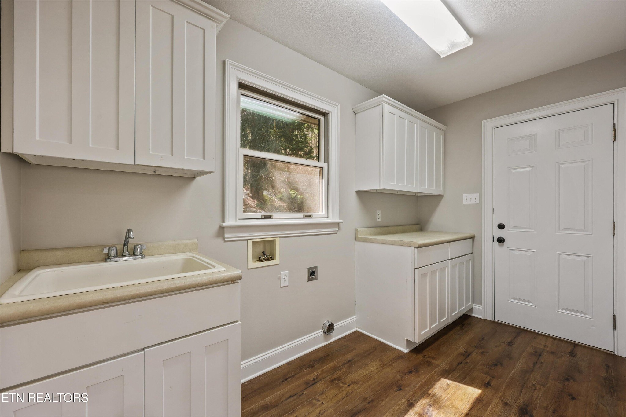 865 Stonegate Way Townsend, TN 37882 - Photo 27 of 60 a room with a sink cabinets and utility room