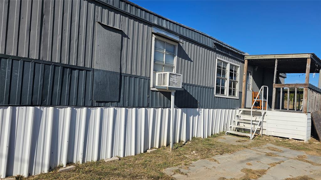413 Lakeview Trail Weatherford, TX 76087 - Photo 24 of 40 a view of a house with wooden fence