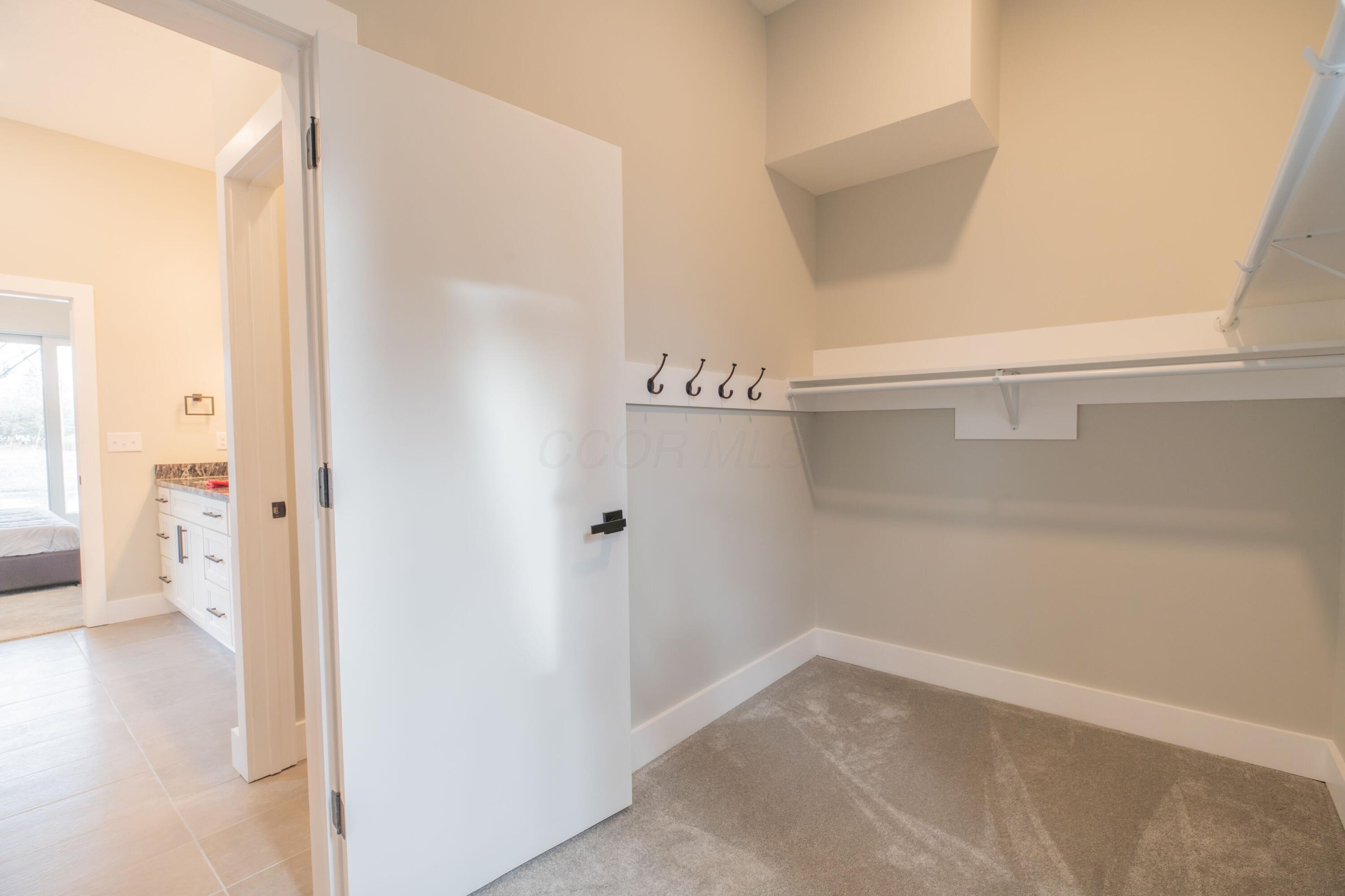 151 Apple Blossom Road Southwest Pataskala, OH 43062 - Photo 25 of 40 Primary walk in closet