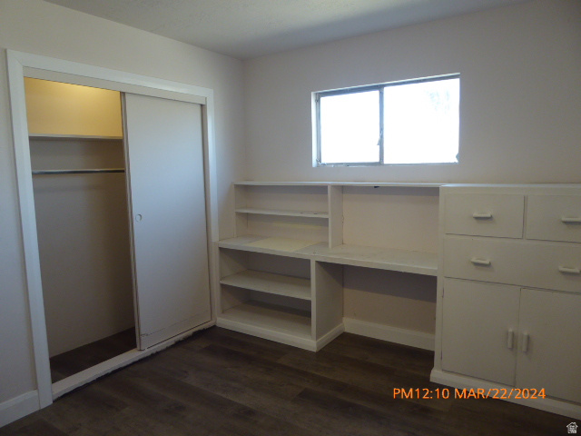 533 East 100 North Price, UT 84501 - Photo 4 of 6 Room featuring wood-finish flooring, a double-pane window, and white walls
