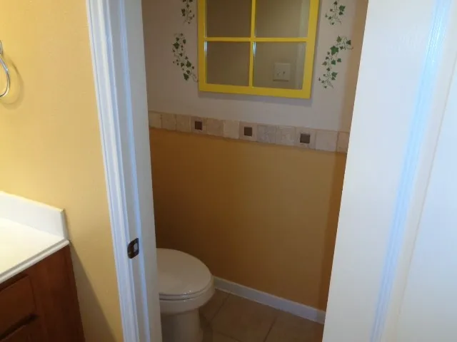 a bathroom with a sink and toilet