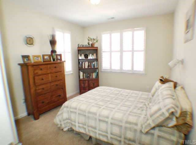 5934 Hourglass Court Raleigh, NC 27612 - Photo 6 of 10 This guest room is very spacious and also has a walk-in closet. Other