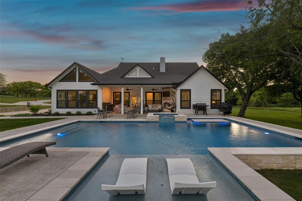 492 County Road 4387 Decatur, TX 76234 - Photo 27 of 40 a view of a house with pool and chairs