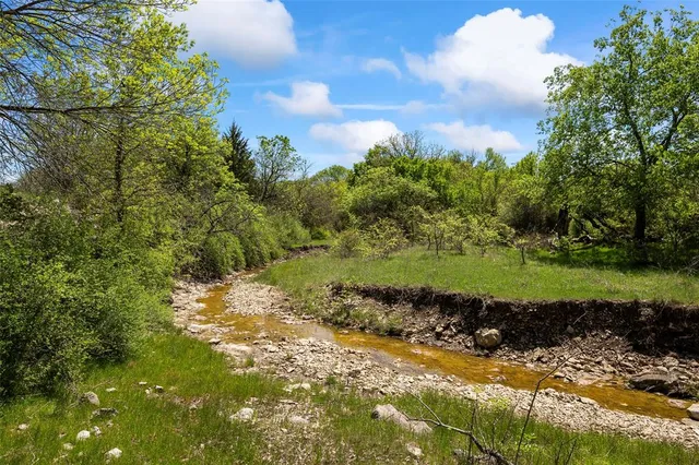 a view of a street with a house