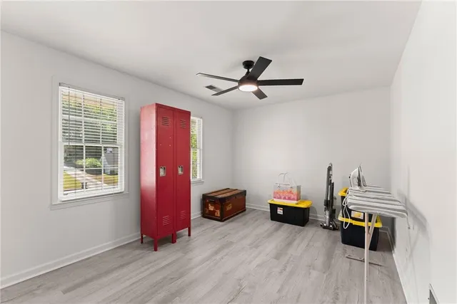 a room with furniture and a window