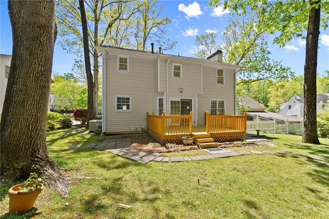 a view of a backyard with a sitting area
