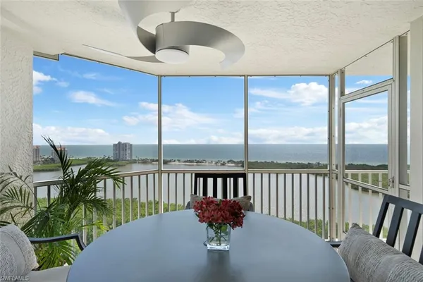 a view of balcony with furniture