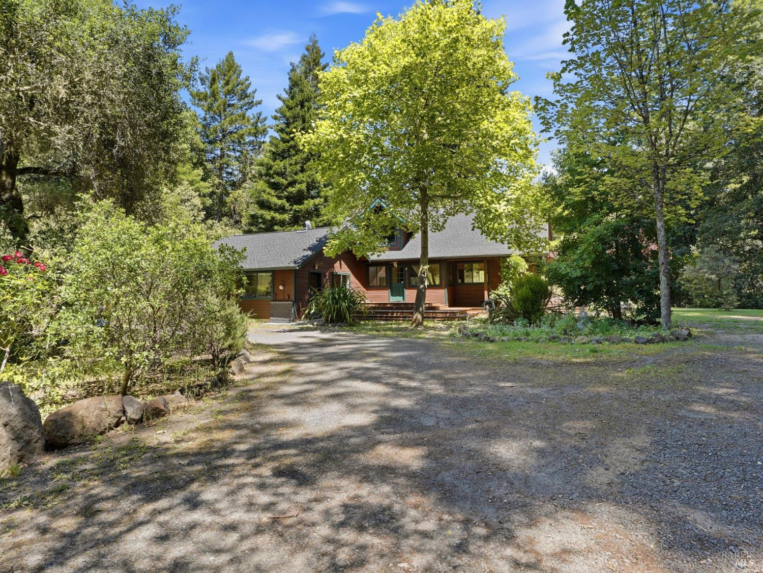 31397 Seaview Road Cazadero, CA 95421 - Photo 34 of 47 a view of a house with a yard